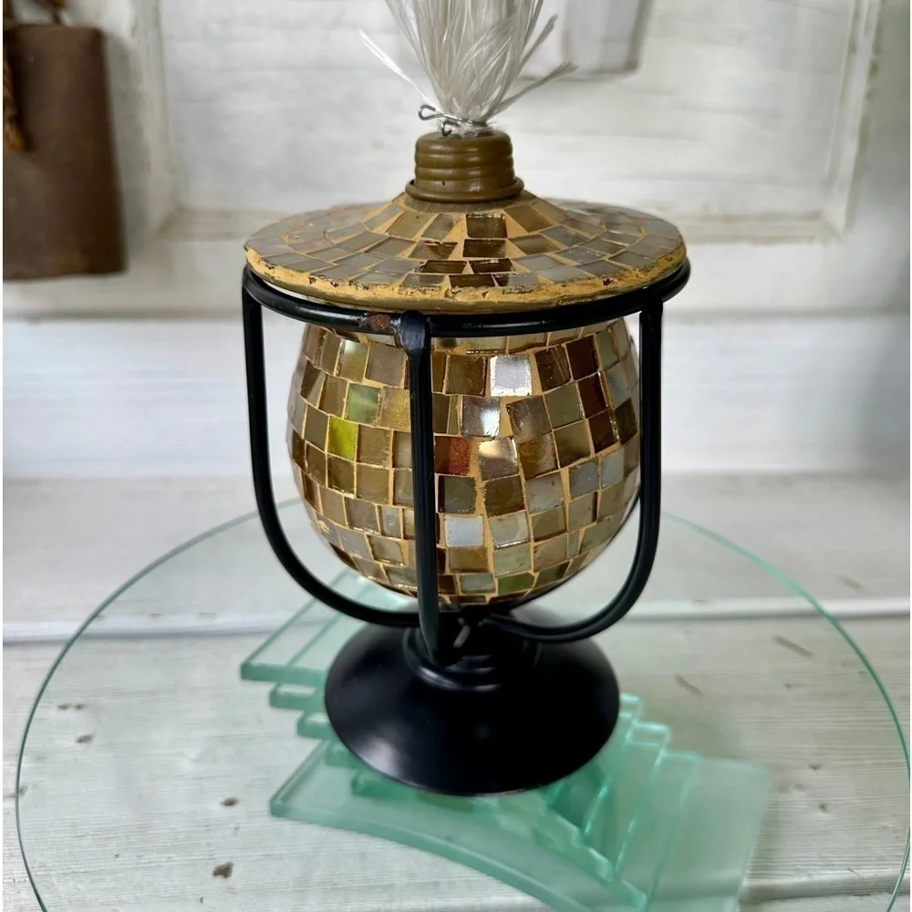 GOLD MOSAIC LANTERN, NWOT, CRADLED IN A BLACK METAL BASE. SCREW-ON TOP.